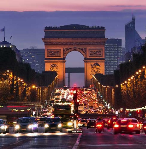 The Arc de Triomphe, largest arch in the world, was commissioned by Napoleon to commemorate the French armies' victories.