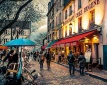 Tourists Exploring the Hilltop city of Montmartre, Paris, France.